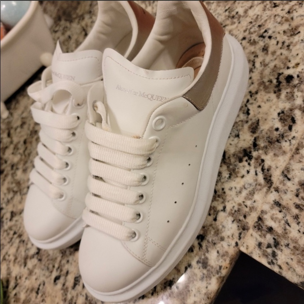 EUR SIZE 40. Metallic silver on back. Comes w/ box